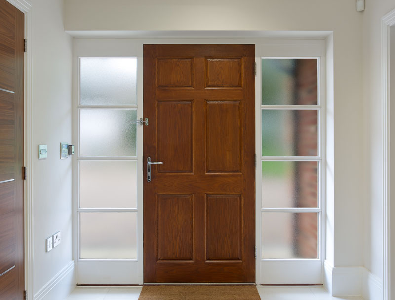 Front-door-with-glass-privacy-side-windows home's front door with privacy textured side windows