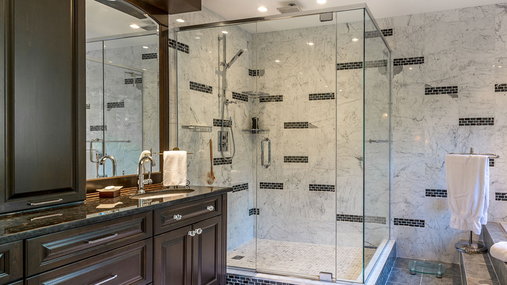 Glass-frameles-shower Bathroom with a frameless glass shower